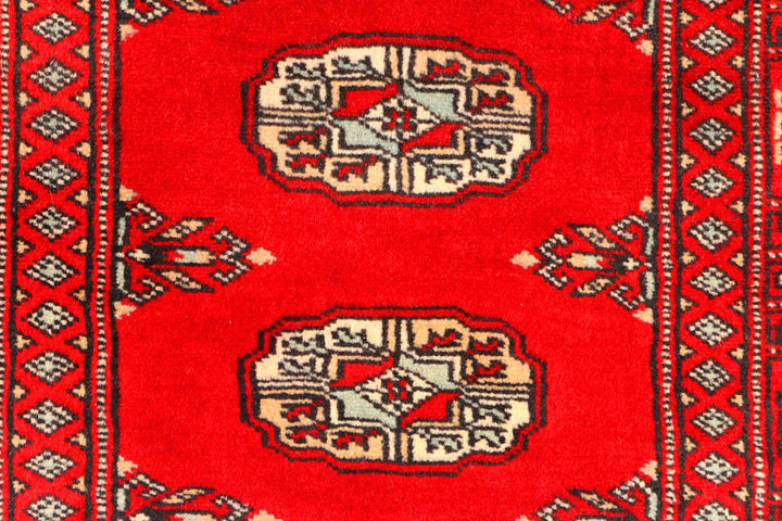 Red Pakistani Bokhara Rug 2' 7" x 9' 3" Hand-Knotted | No. QA17717