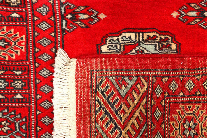 Red Pakistani Bokhara Rug 2' 7" x 9' 3" Hand-Knotted | No. QA17717