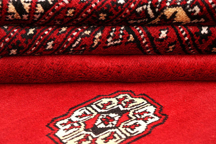 Red Pakistani Bokhara Rug 6'2" x 9'1" Hand-Knotted | No. QA17745