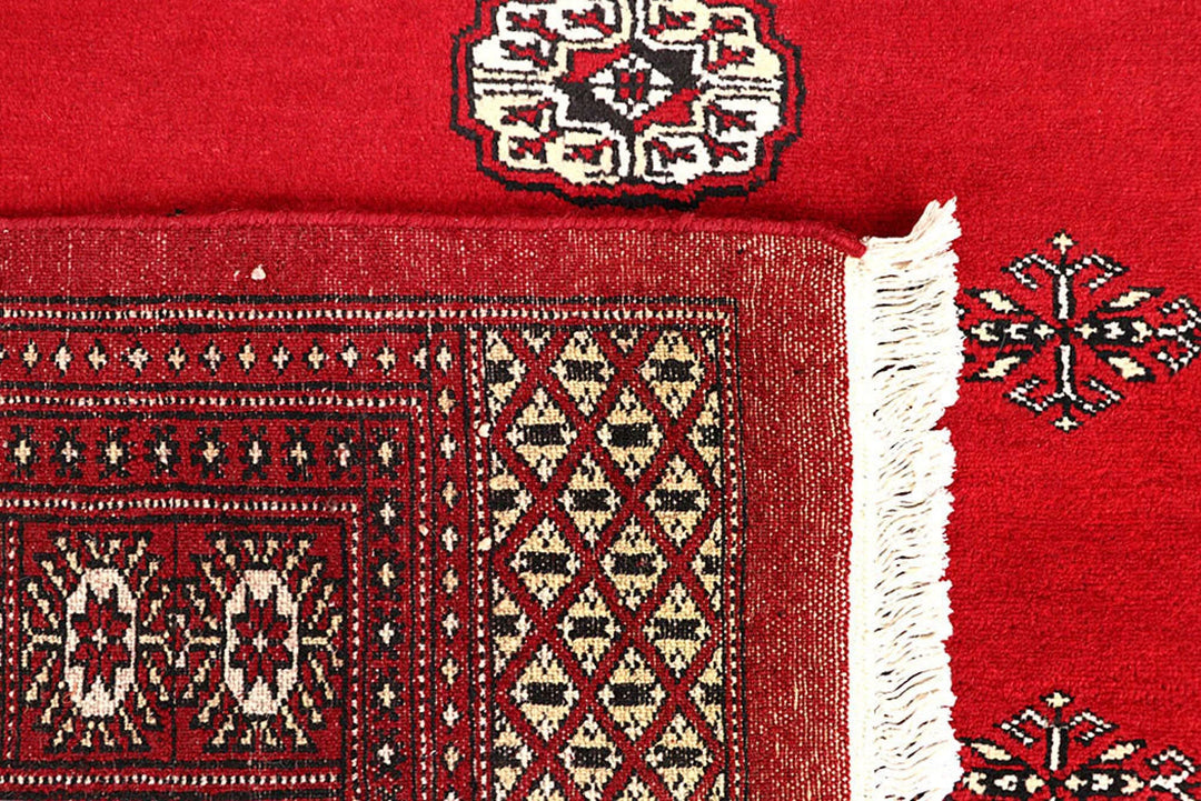Red Pakistani Bokhara Rug 6'2" x 9'1" Hand-Knotted | No. QA17745