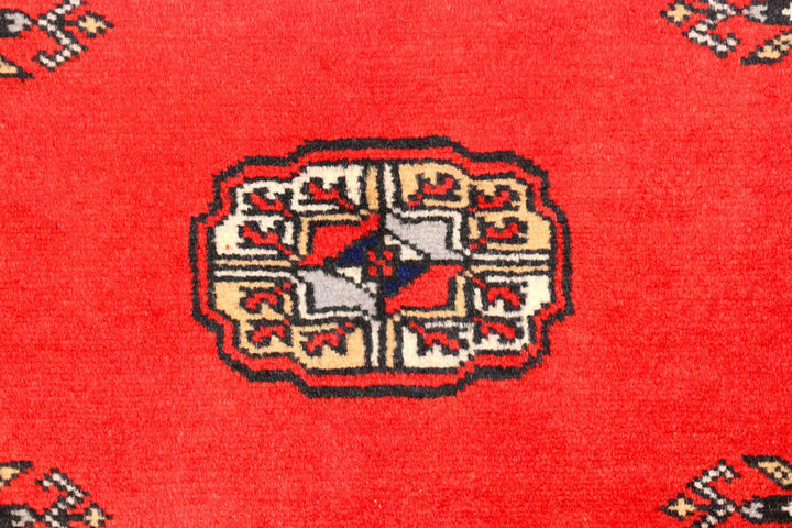 Red Pakistani Bokhara Rug 2' 7" x 11' 8" Hand-Knotted | No. QA18298