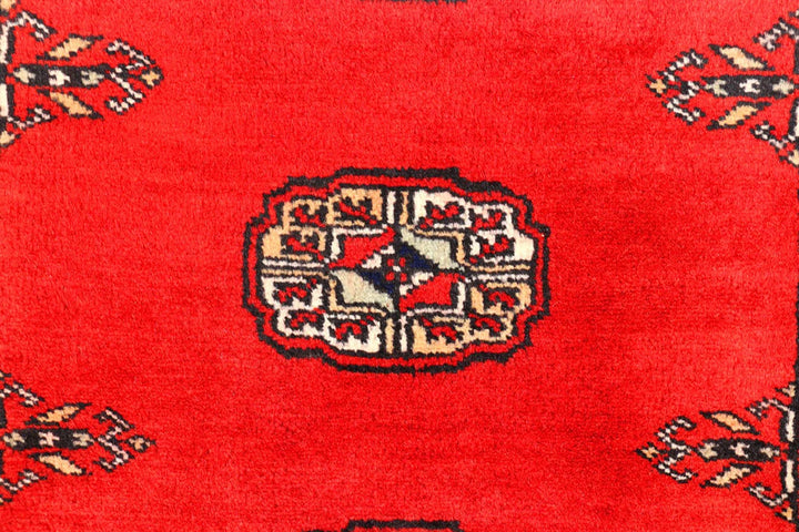 Red Pakistani Bokhara Rug 2' 7" x 11' 10" Hand-Knotted | No. QA18444