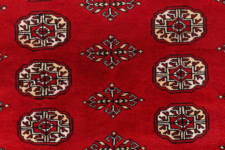 Red Pakistani Bokhara Rug 8' x 10' Hand-Knotted | No. QA18511