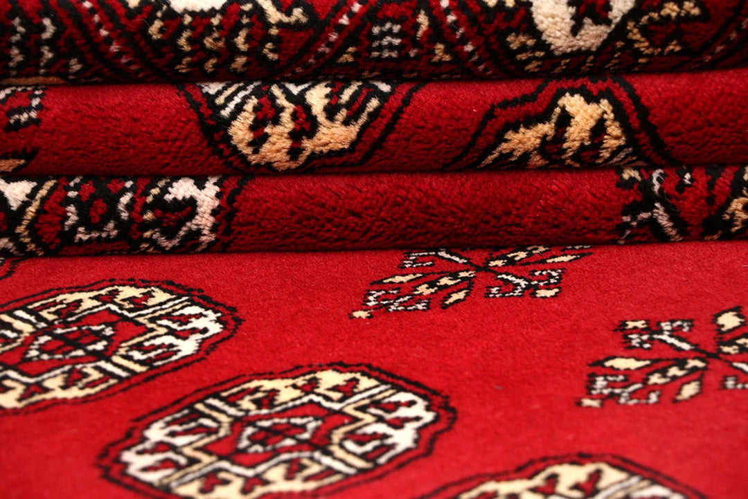 Red Pakistani Bokhara Rug 8' x 10' Hand-Knotted | No. QA18511