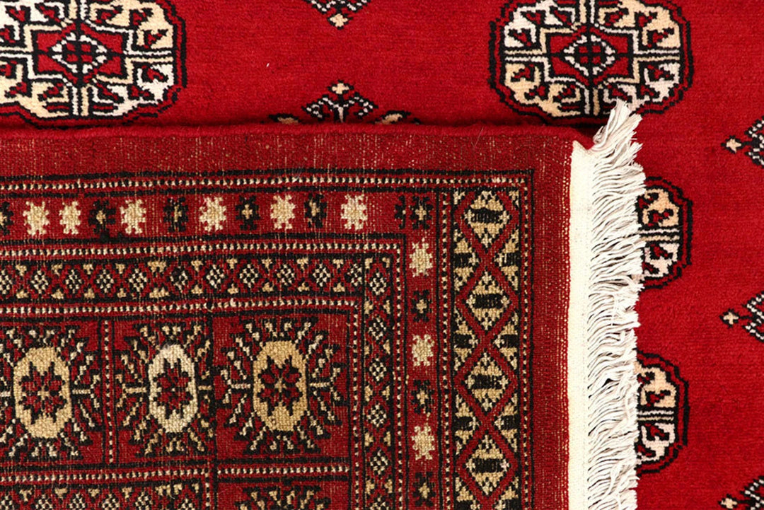 Red Pakistani Bokhara Rug 8' x 10' Hand-Knotted | No. QA18511