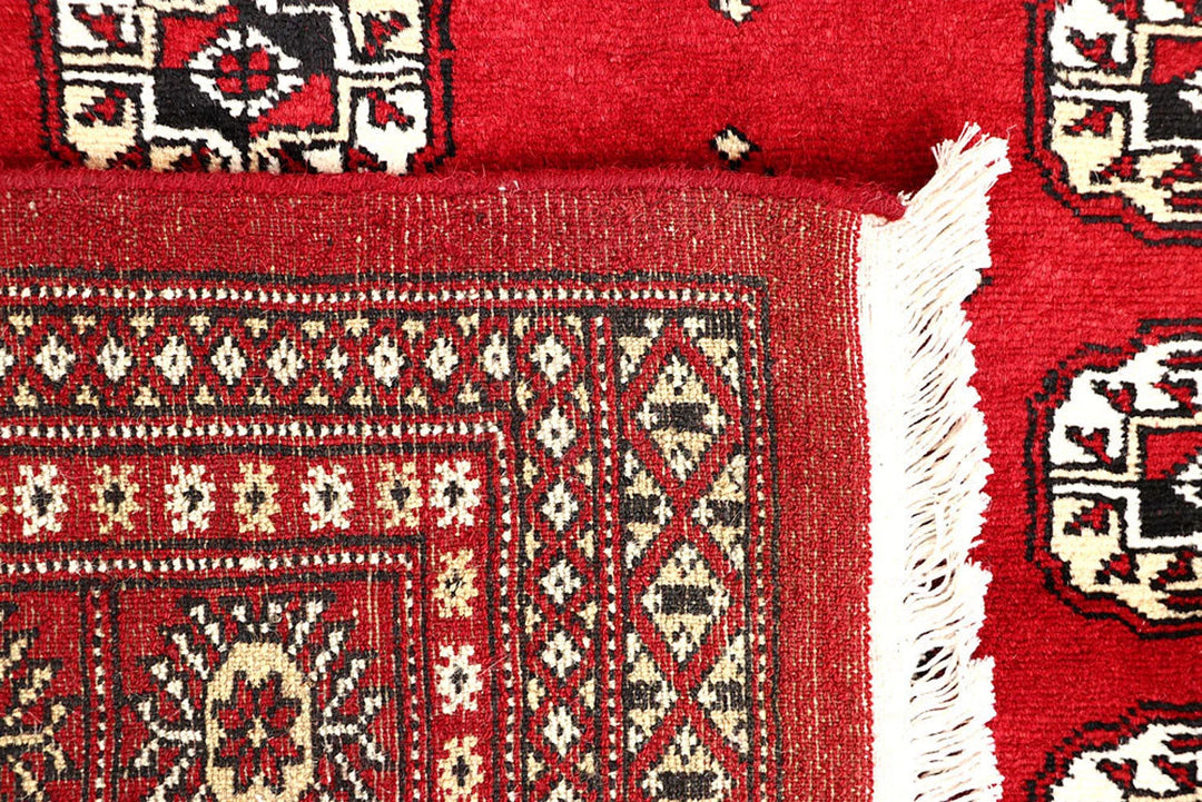 Red Pakistani Bokhara Rug 5' 7" x 8' 5" Hand-Knotted | No. QA19021