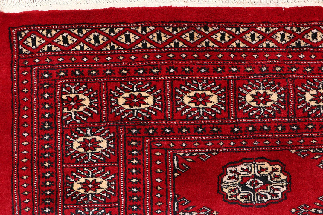 Red Pakistani Bokhara Rug 4' 1" x 6' 2" Hand-Knotted | No. QA19481