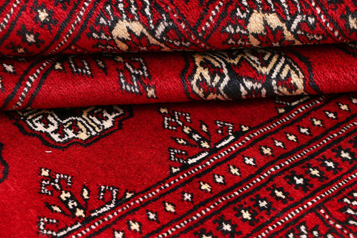 Red Pakistani Bokhara Rug 4' 1" x 6' 2" Hand-Knotted | No. QA19481