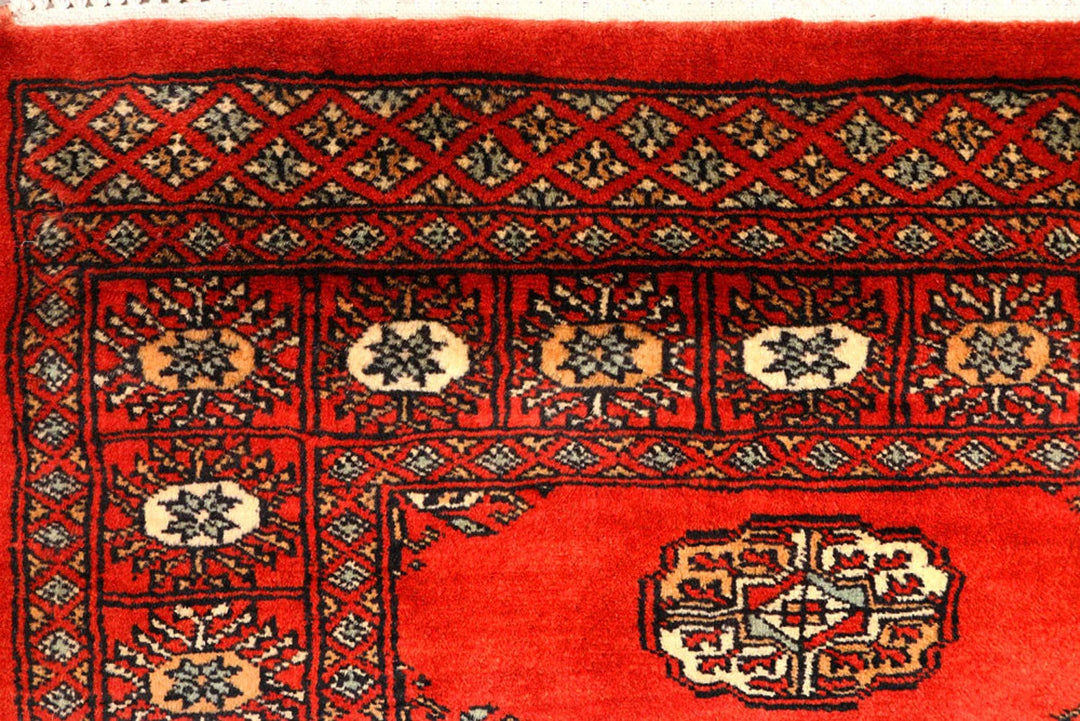 Firebrick Pakistani Bokhara Runner 2' 7" x 10' 7" Hand-Knotted | No. QA19793