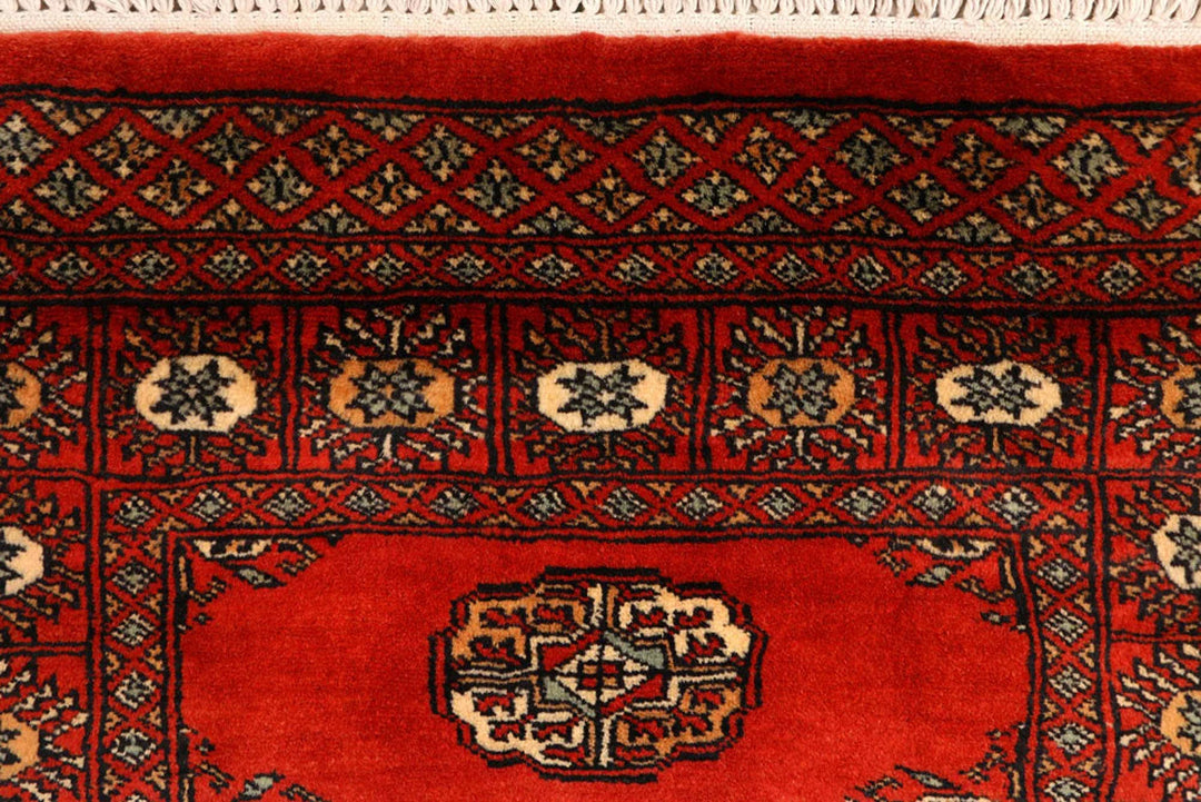 Firebrick Pakistani Bokhara Runner 2' 7" x 10' 7" Hand-Knotted | No. QA19793