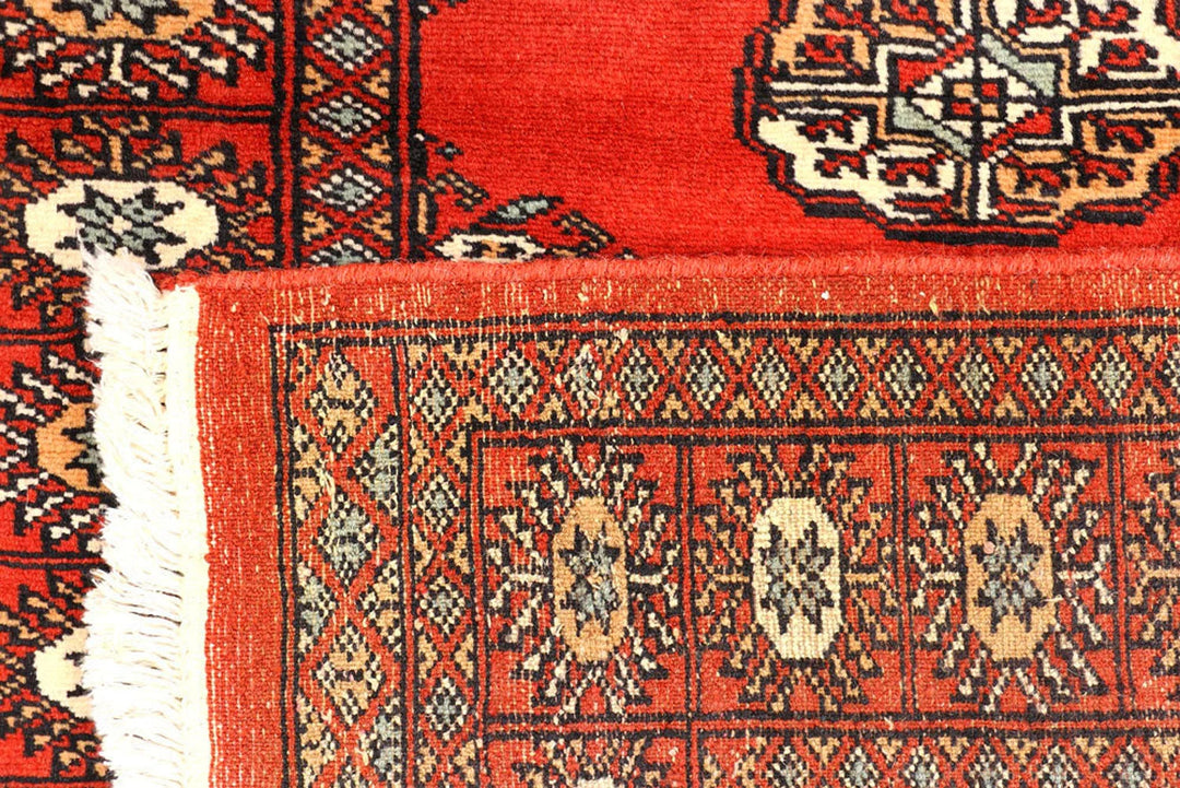 Firebrick Pakistani Bokhara Runner 2' 7" x 10' 7" Hand-Knotted | No. QA19793