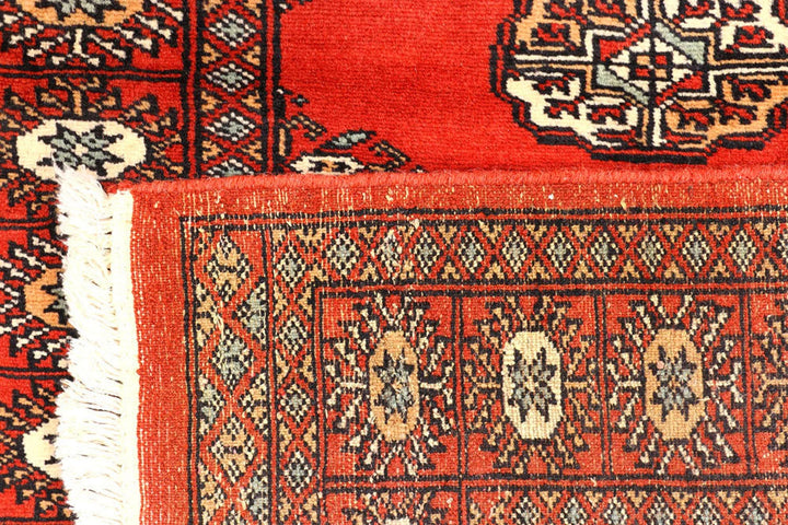 Firebrick Pakistani Bokhara Runner 2' 7" x 10' 7" Hand-Knotted | No. QA19793