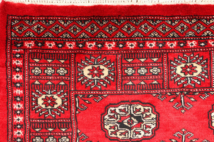 Red Pakistani Bokhara Rug 3' 1" x 5' 6" Hand-Knotted | No. QA20020