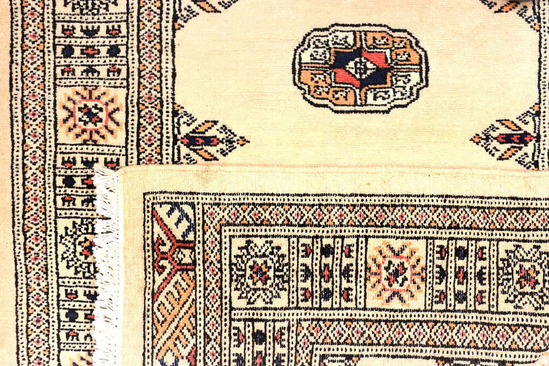 Antique White Pakistani Bokhara Rug 2' 7" x 10' 5" Hand-Knotted | No. QA20047