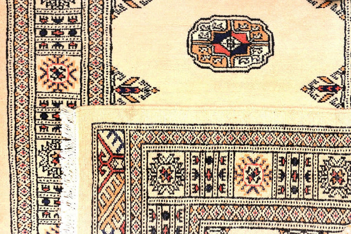 Antique White Pakistani Bokhara Rug 2' 7" x 10' 5" Hand-Knotted | No. QA20047