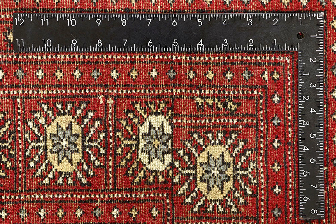 Red Pakistani Bokhara Rug 6' 6" x 9' 2" Hand-Knotted | No. QA20110