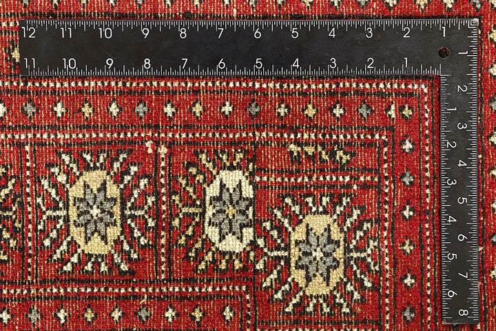 Red Pakistani Bokhara Rug 6' 6" x 9' 2" Hand-Knotted | No. QA20110