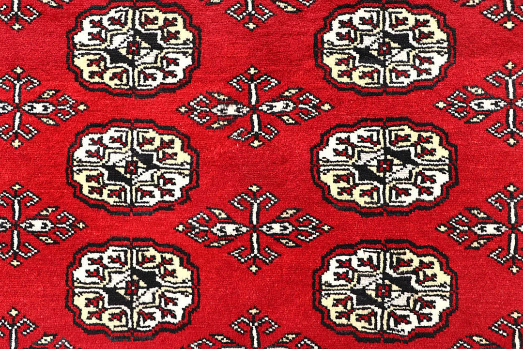 Red Pakistani Bokhara Rug 6' x 9' Hand-Knotted | No. QA20779