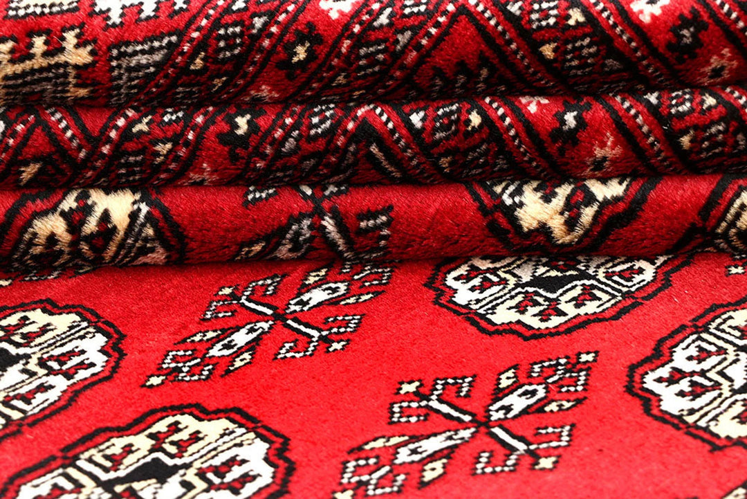 Red Pakistani Bokhara Rug 6' x 9' Hand-Knotted | No. QA20779