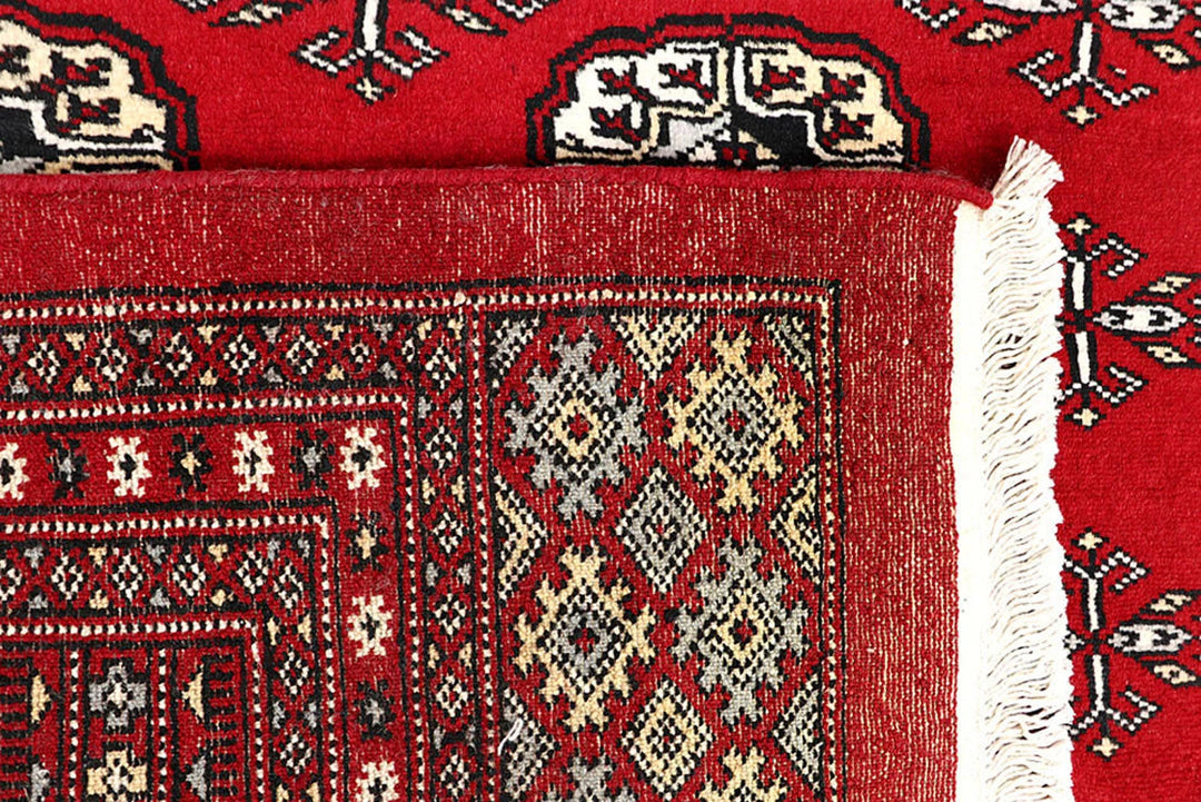 Red Pakistani Bokhara Rug 6' x 9' Hand-Knotted | No. QA20779