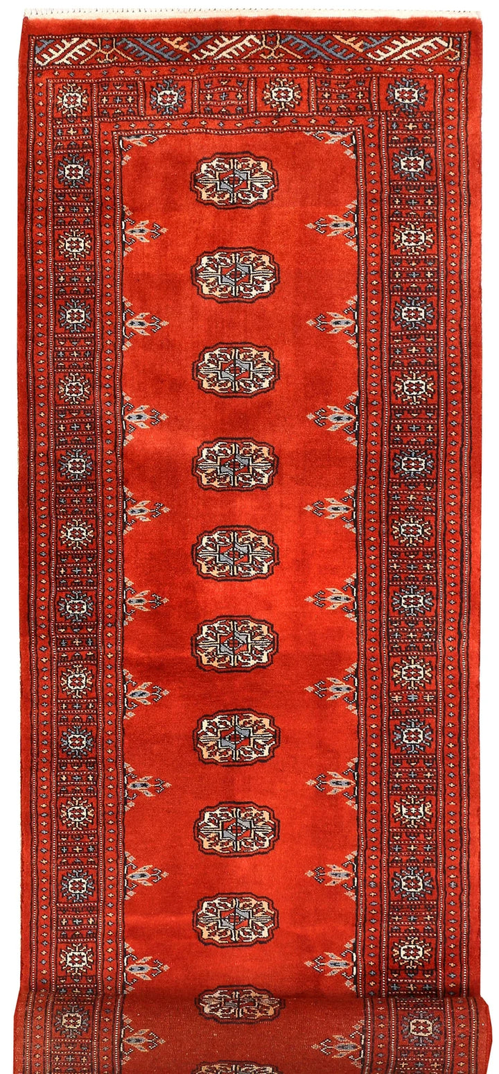 Red Pakistani Bokhara Rug 2' 7" x 10' 3" Hand-Knotted | No. QA20931