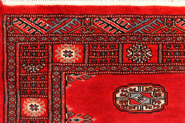 Dark Red Pakistani Bokhara Rug 2' 7" x 10' 9" Hand-Knotted | No. QA21033