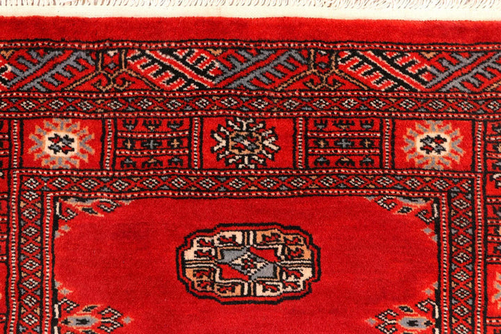 Dark Red Pakistani Bokhara Rug 2' 7" x 10' 9" Hand-Knotted | No. QA21033