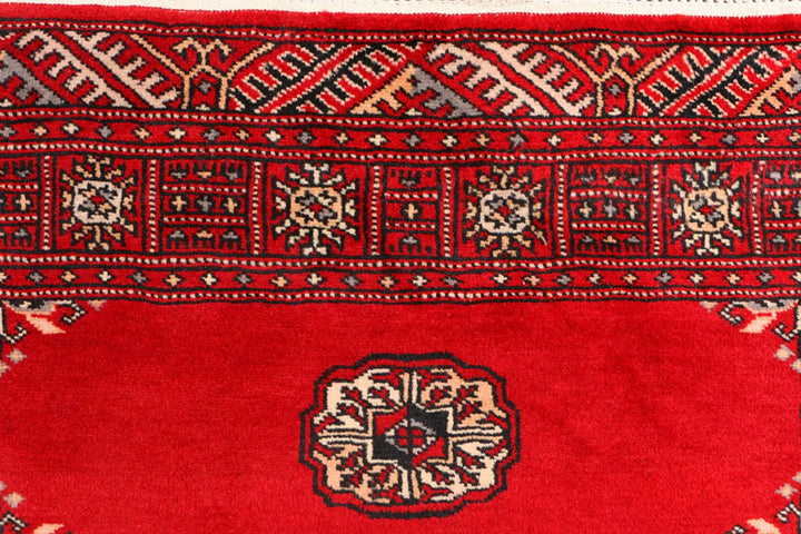 Red Pakistani Bokhara Rug 3' 1" x 5' 7" Hand-Knotted | No. QA21057