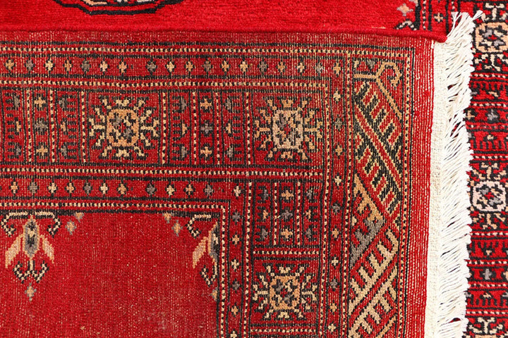 Red Pakistani Bokhara Rug 3' 1" x 5' 7" Hand-Knotted | No. QA21057