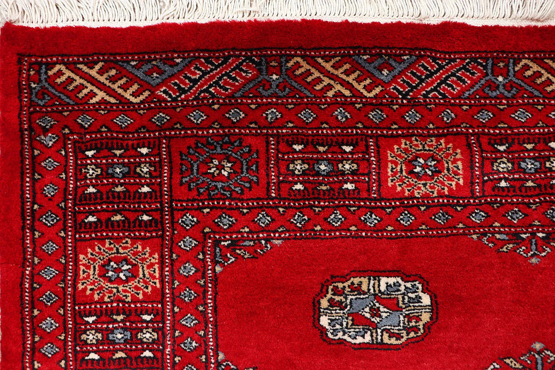 Red Bokhara Rug 4' 2" x 6' 7" Hand-Knotted | No. QA21222