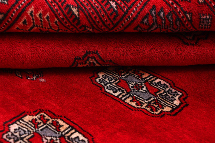 Red Pakistani Bokhara Rug 4' 1" x 6' Hand-Knotted | No. QA21627