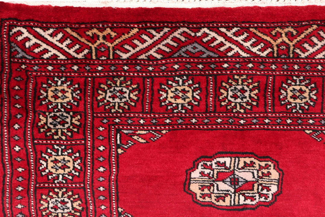 Dark Red Pakistani Bokhara Rug 2' 6" x 10' 6" Hand-Knotted | No. QA21775