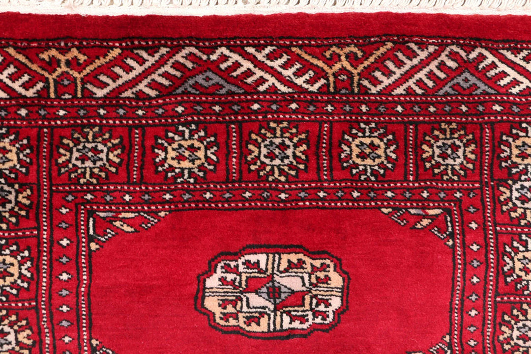 Dark Red Pakistani Bokhara Rug 2' 6" x 10' 6" Hand-Knotted | No. QA21775