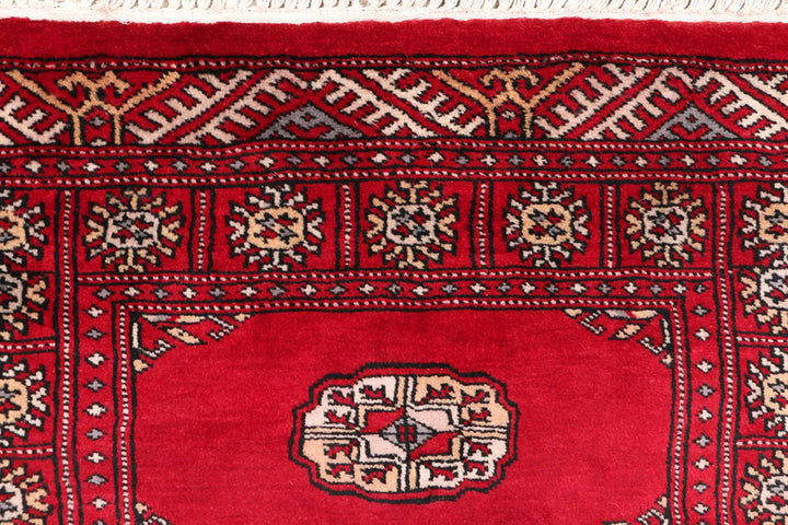Dark Red Pakistani Bokhara Rug 2' 6" x 10' 6" Hand-Knotted | No. QA21775