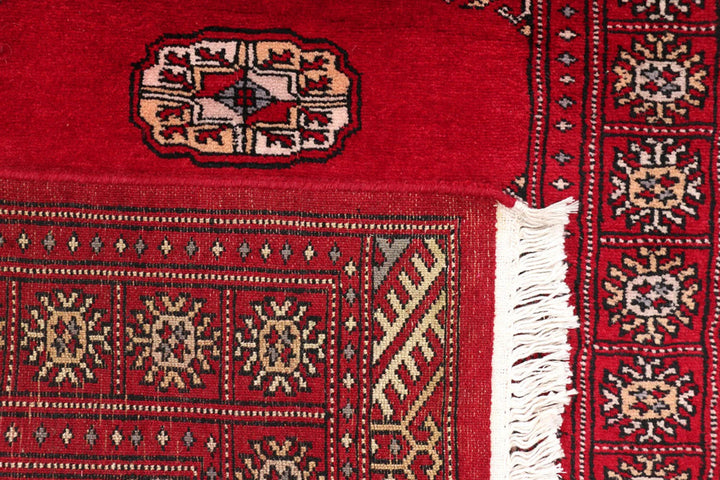 Dark Red Pakistani Bokhara Rug 2' 6" x 10' 6" Hand-Knotted | No. QA21775