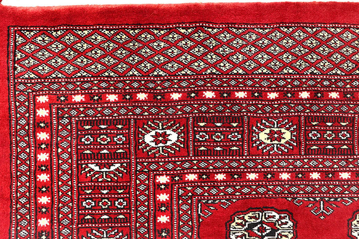 Red Pakistani Bokhara Rug 6' x 8' 10" Hand-Knotted | No. QA22244