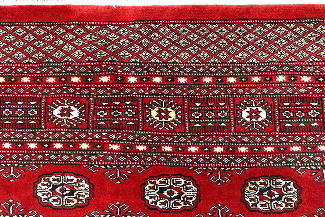 Red Pakistani Bokhara Rug 6' x 8' 10" Hand-Knotted | No. QA22244