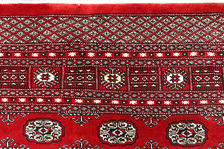 Red Pakistani Bokhara Rug 6' x 8' 10" Hand-Knotted | No. QA22244