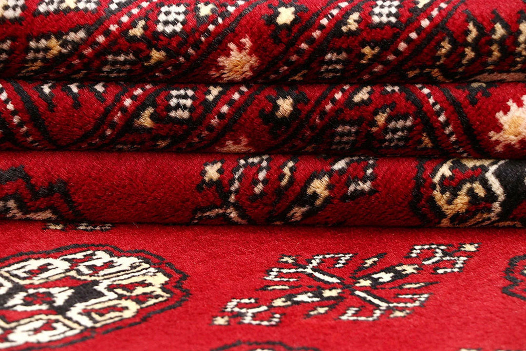 Red Pakistani Bokhara Rug 6' x 8' 10" Hand-Knotted | No. QA22244