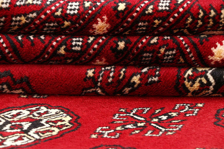 Red Pakistani Bokhara Rug 6' x 8' 10" Hand-Knotted | No. QA22244