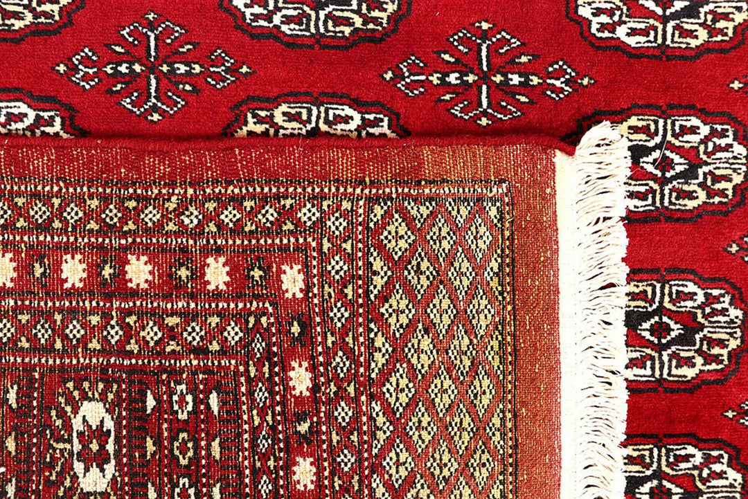 Red Pakistani Bokhara Rug 6' x 8' 10" Hand-Knotted | No. QA22244