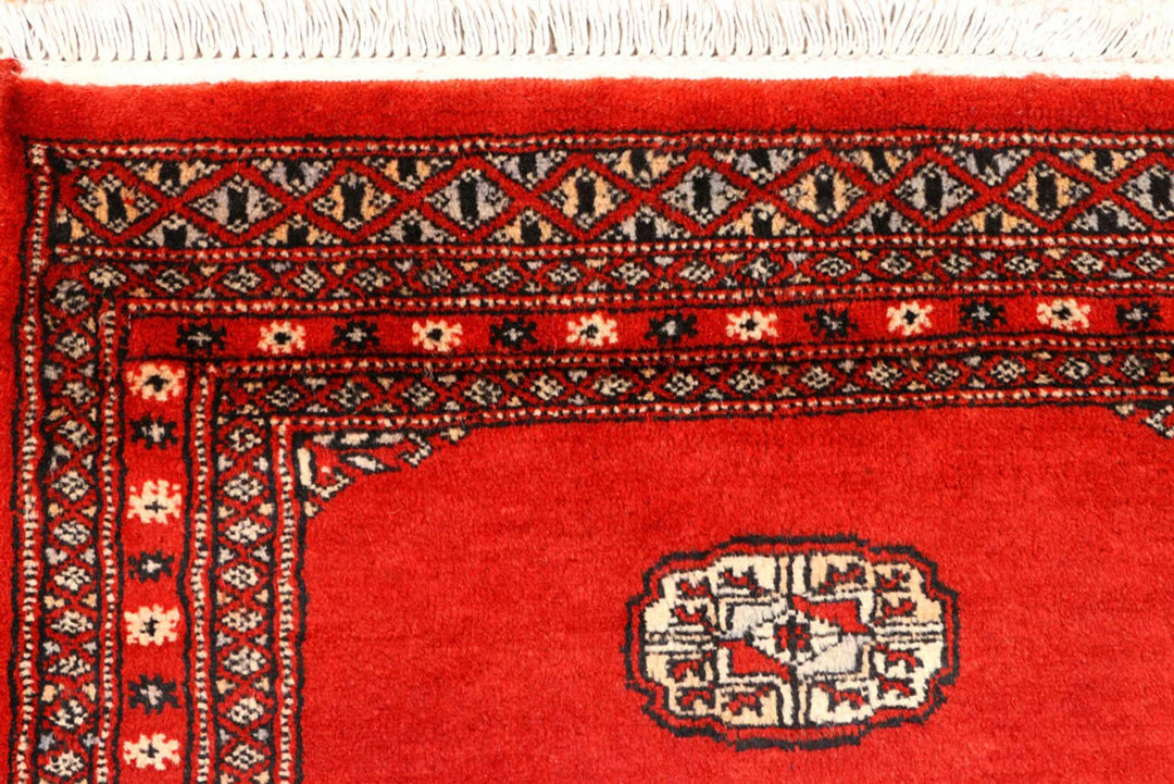 Red Pakistani Bokhara Rug 2' 7" x 8' 8" Hand-Knotted | No. QA22687