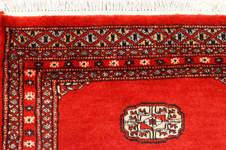 Red Pakistani Bokhara Rug 2' 7" x 8' 8" Hand-Knotted | No. QA22687