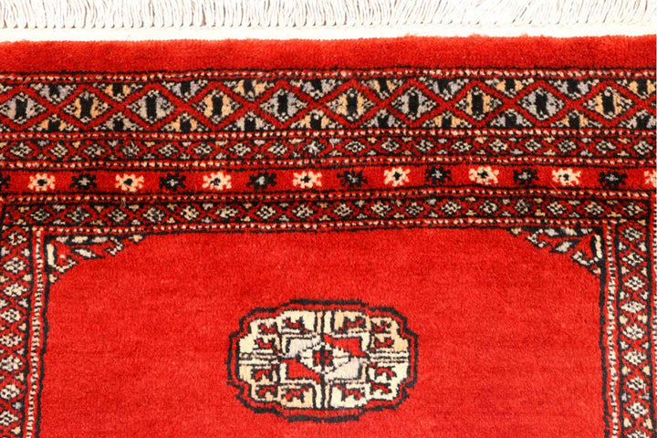 Red Pakistani Bokhara Rug 2' 7" x 8' 8" Hand-Knotted | No. QA22687