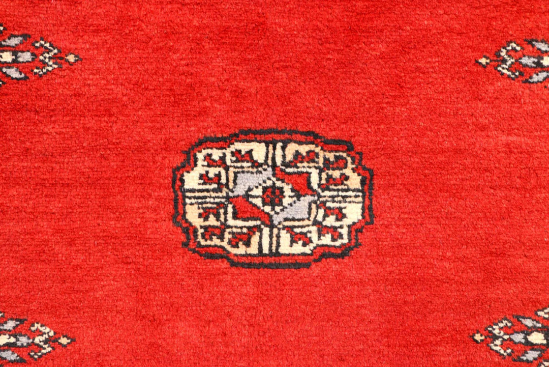 Red Pakistani Bokhara Rug 2' 7" x 8' 8" Hand-Knotted | No. QA22687
