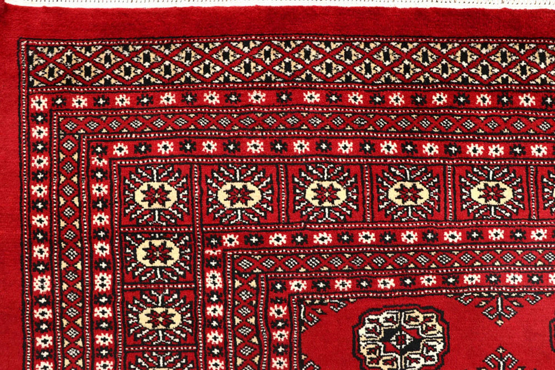Red Pakistani Bokhara Rug 8' x 10'4" Hand-Knotted | No. QA22750