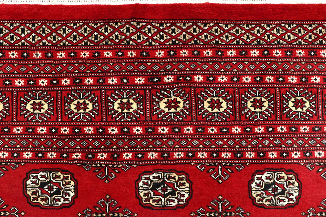 Red Pakistani Bokhara Rug 8' x 10'4" Hand-Knotted | No. QA22750