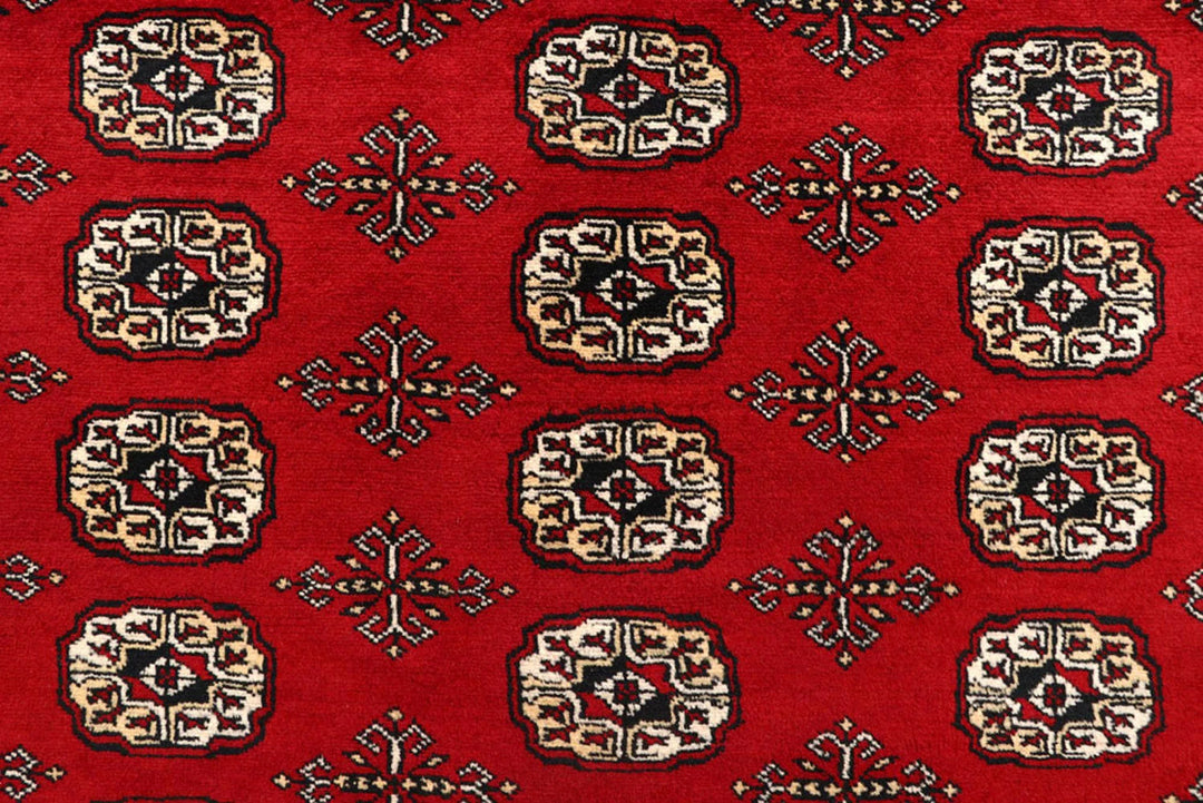Red Pakistani Bokhara Rug 8' x 10'4" Hand-Knotted | No. QA22750