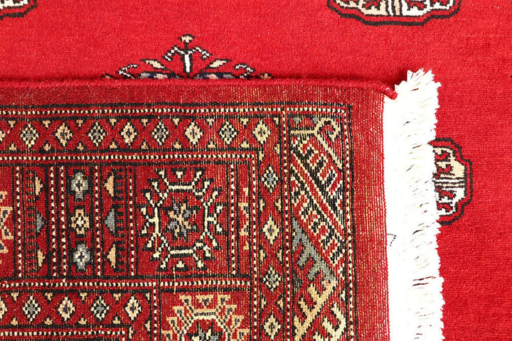 Red Pakistani Bokhara Rug 4' 1" x 5' 11" Hand-Knotted | No. QA23281