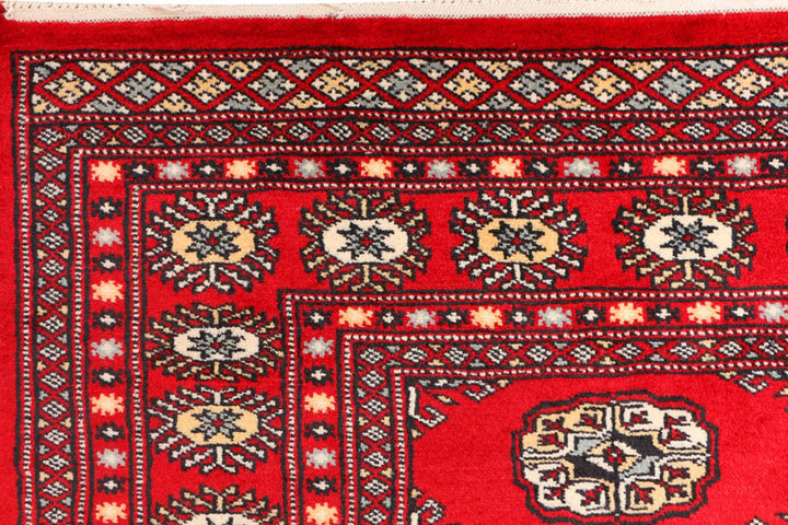 Red Pakistani Bokhara Rug 3' 1" x 5' 7" Hand-Knotted | No. QA23324